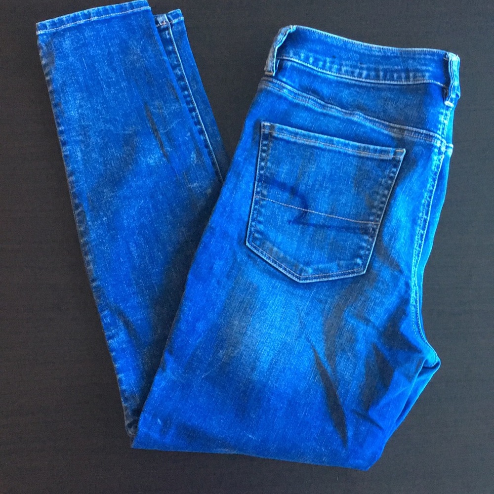 American Eagle, medium wash denim jeans.